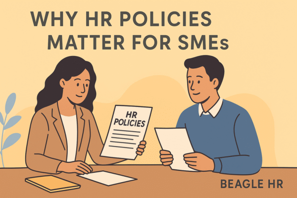 Small business owner and HR consultant reviewing HR policies together - Beagle HR.